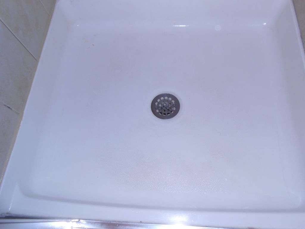 The same shower stall floor after we cleaned it.
