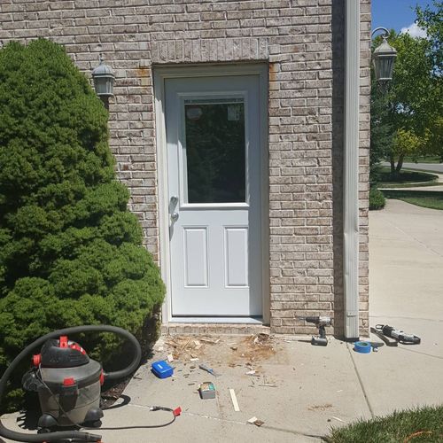 New door install after existing door was rotted ou