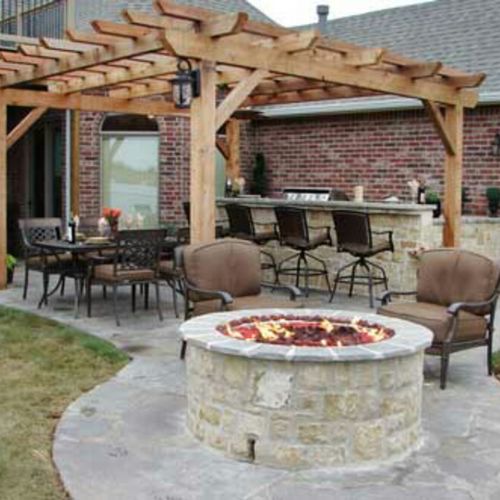 Outdoor kitchen, fire pit and covering