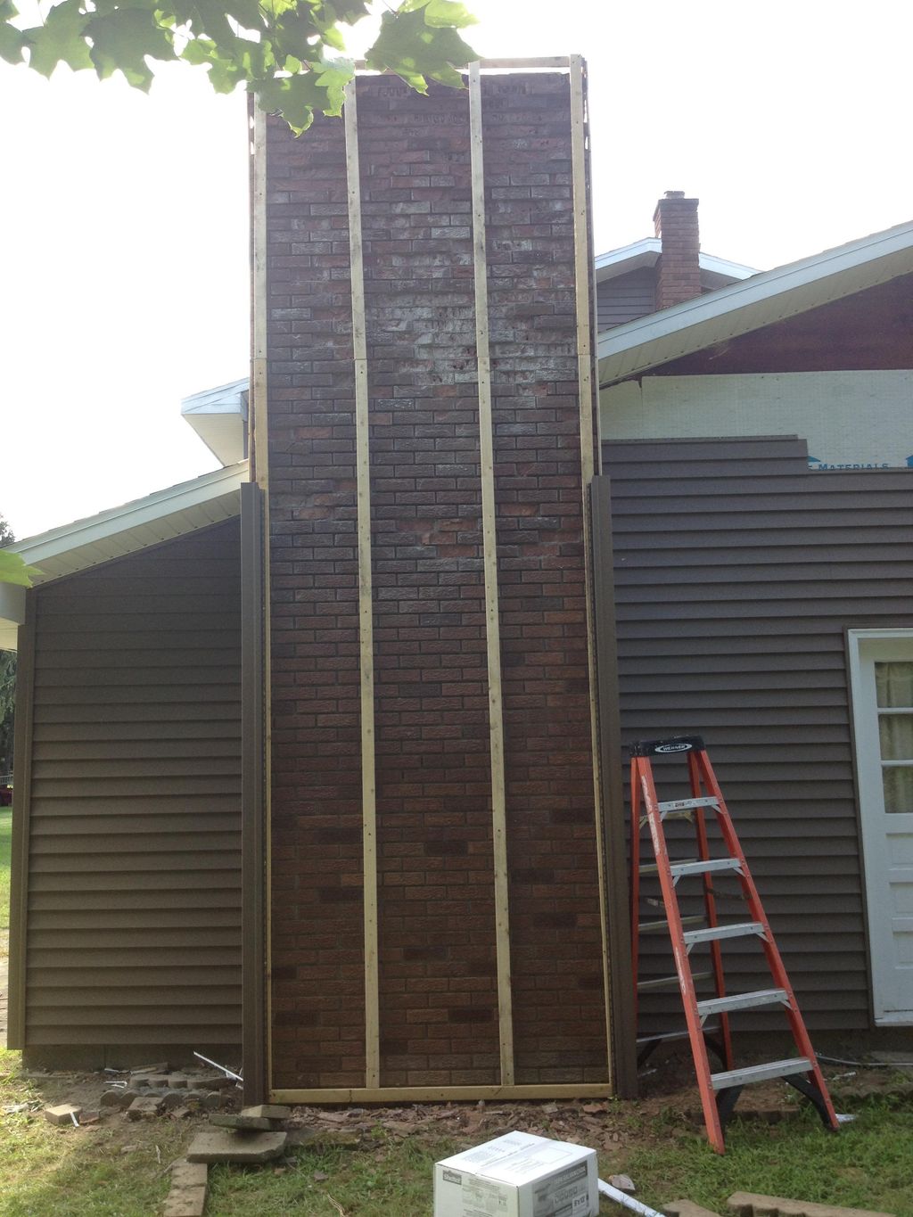 Building out chimney for vinyl siding