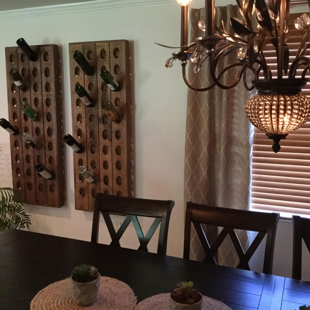 Reclaimed wood riddling racks add character to the