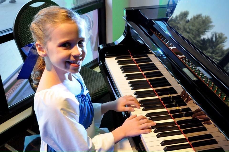 A little princess at a Disney themed recital - her