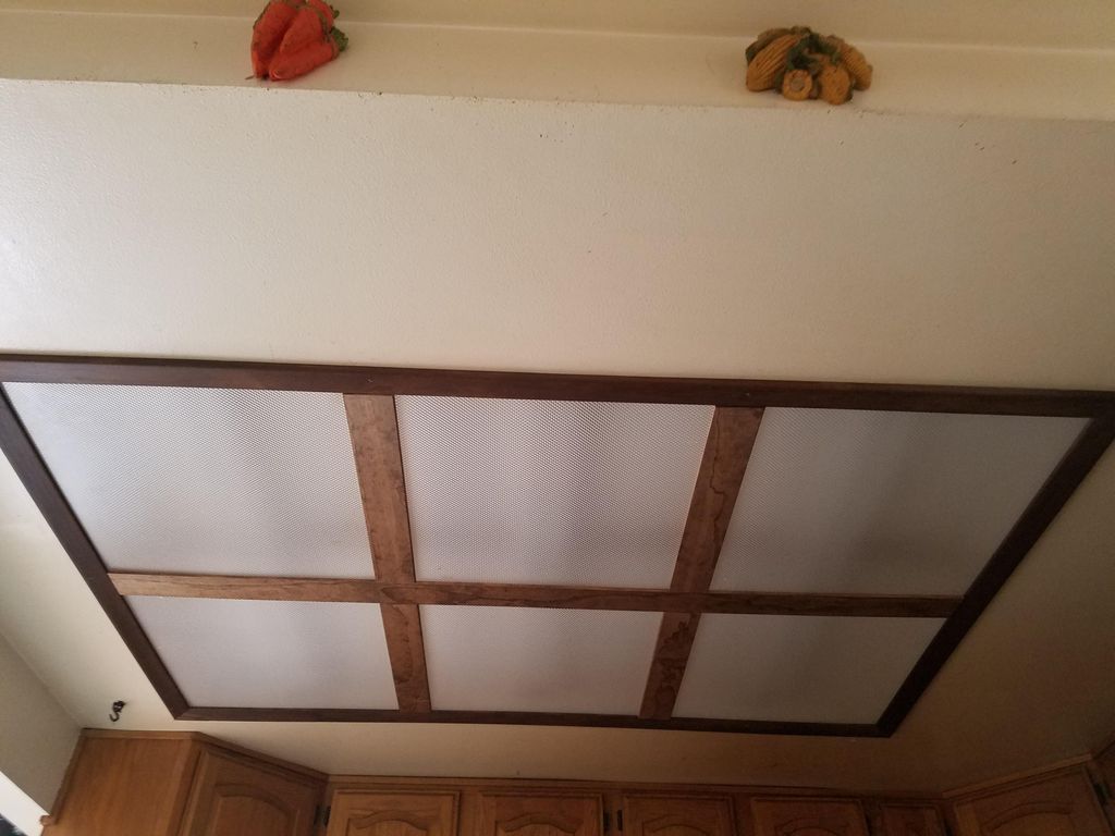 Custome made kitchen light fixture made from recla