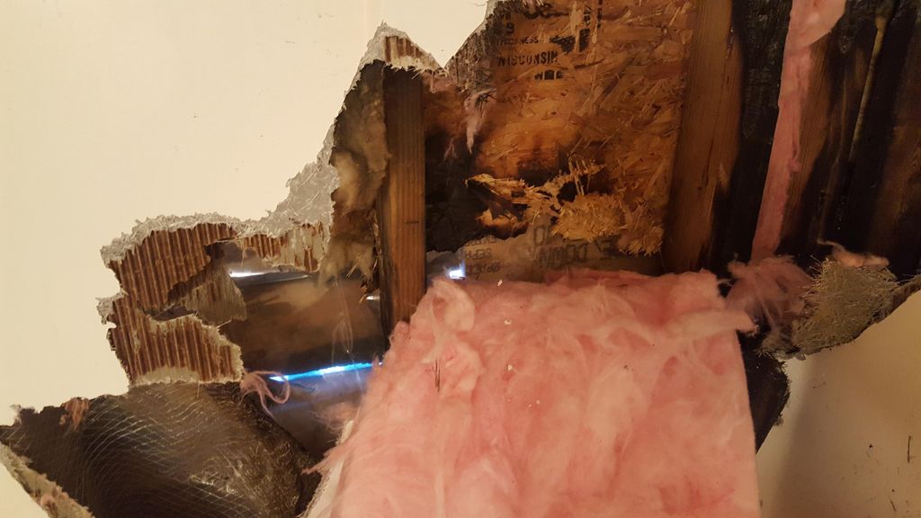 fire burnt through the wall