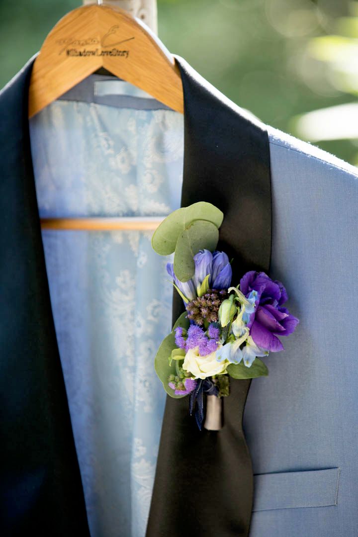 A custom suit deserves a custom boutonniere.