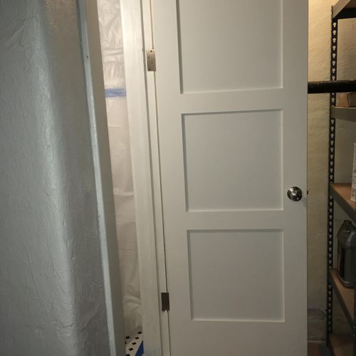 Install slab doors & hardware