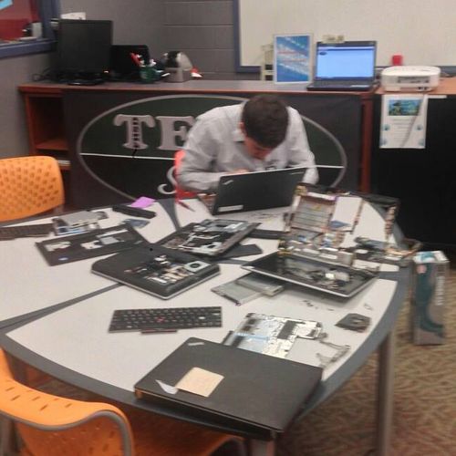 Repairing laptops for a local middle school in Cin
