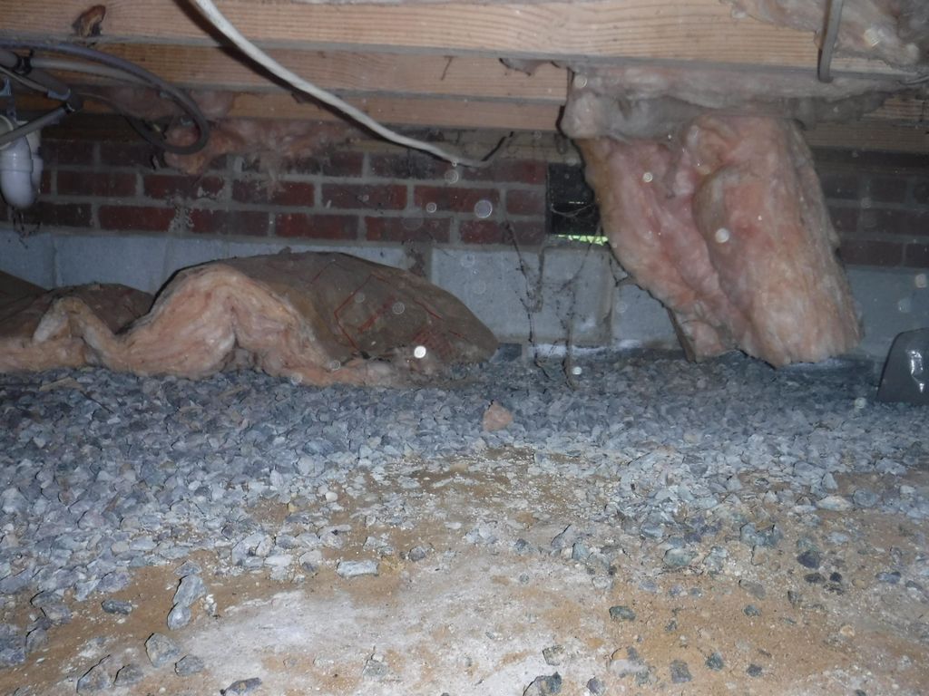 Example damaged insulation in a crawlspace. Damage