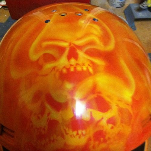 Airbrushed helmet, top view real fire and skulls