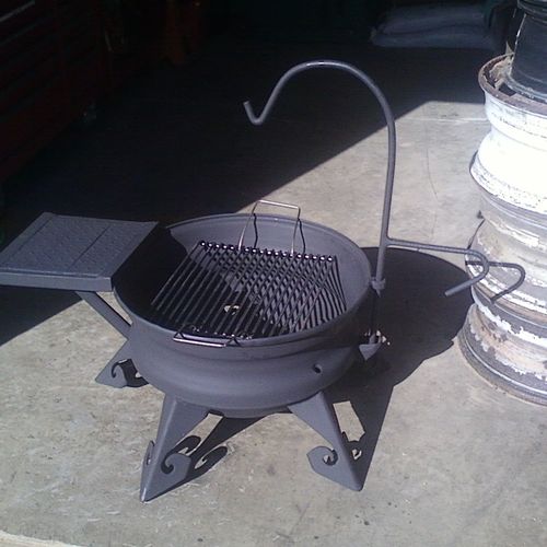 Fire ring with removable grill, shelf and pot hang