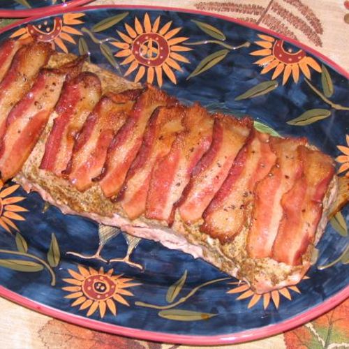 This is a pork roast wrapped in Bacon and finished