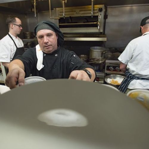Troy Nance prepares the kitchen for dinner service