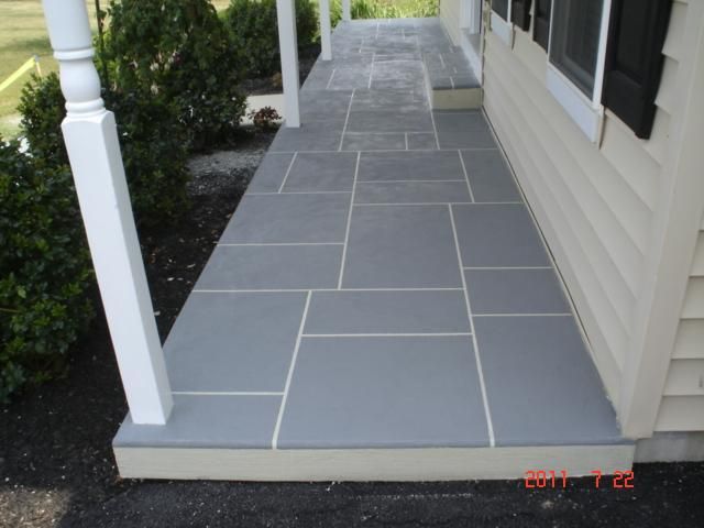 Hand Tape Ashlar Slate pattern.
Hand trowel finish