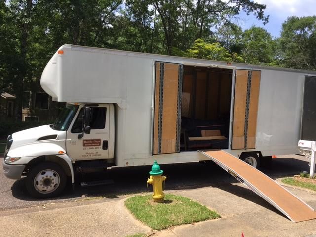 Handy Guys Moving Van on the Job
