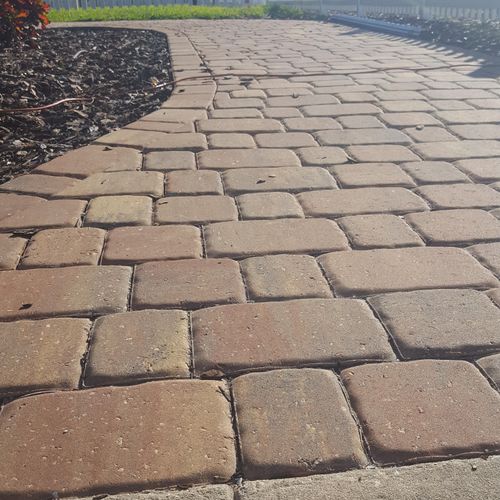 Laid stone pavers to create beautiful front walkwa