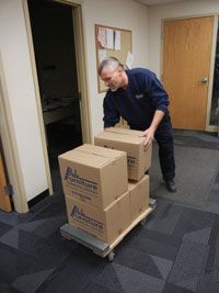 Here is Craig moving a dolly load of All Furniture