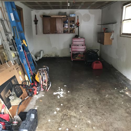 Garage During Water Removal and Demo