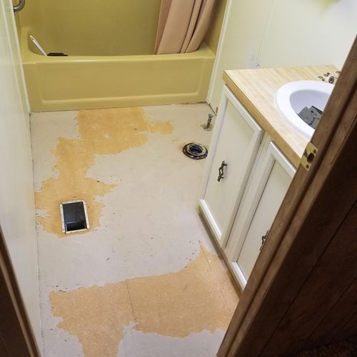 Tear out of existing bathroom flooring