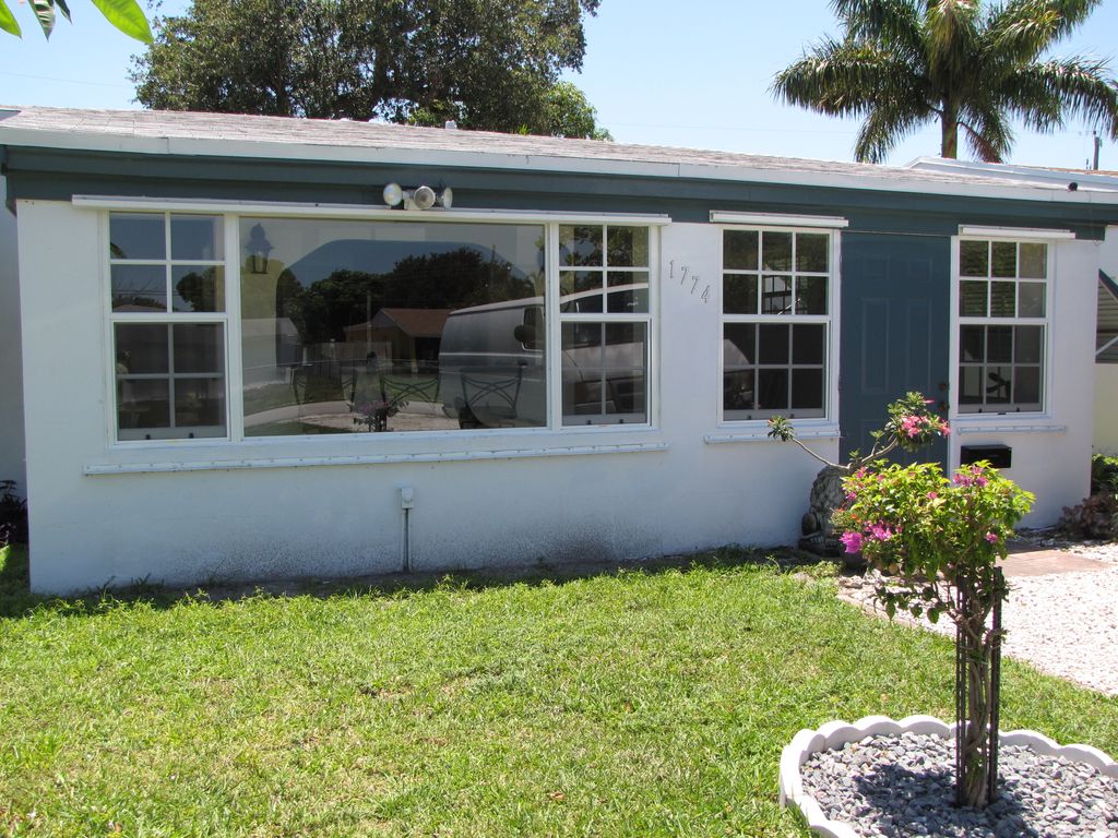 Custom windows were replaced and home repainted. T