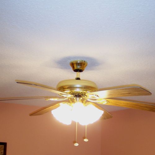 Ceiling fan installed in a lady's guest bedroom.  