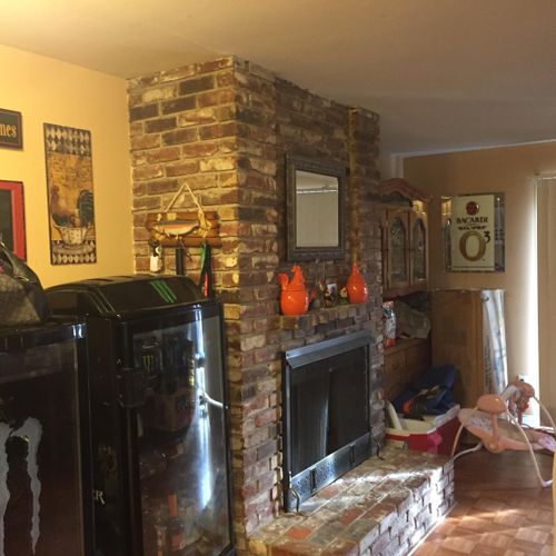 Remove fireplace and turn two small rooms into one