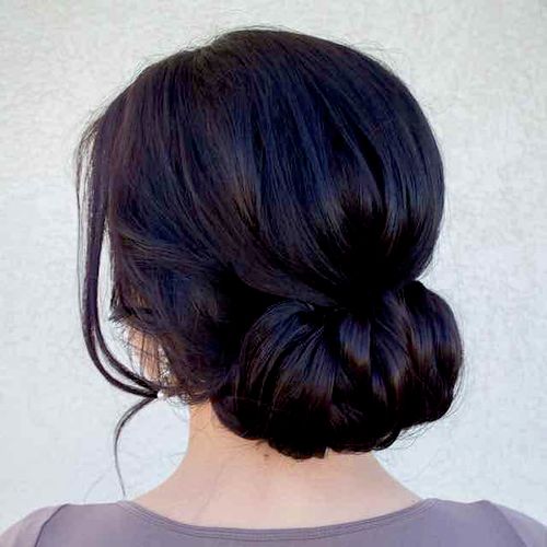 Rolled Chignon updo by Face Body Beauty