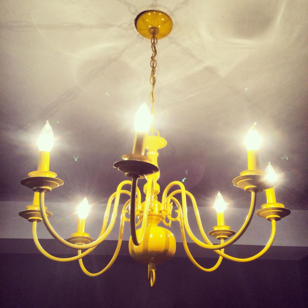 antique brass chandelier refinished with yellow pa