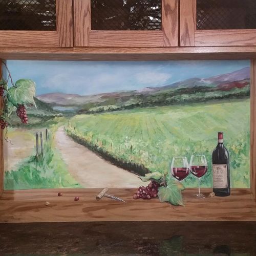 Wine cellar mural with Trompe-l'œil wine bottle an