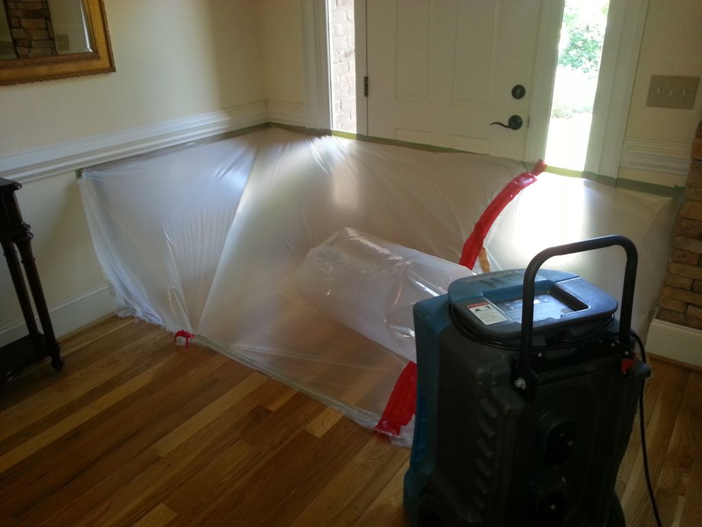 A tent is set up here to save and dry the hardwood