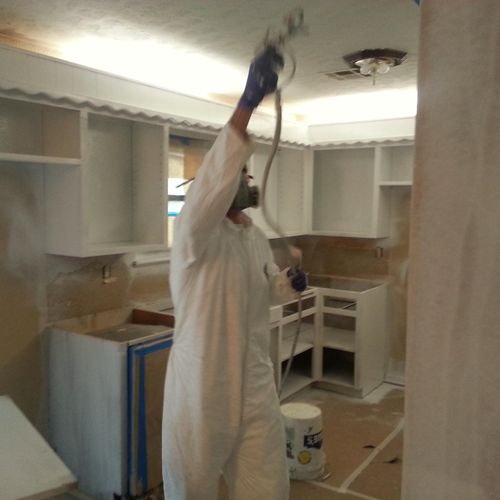 Spraying kitchen cabinets