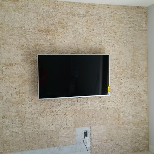 Split face feature wall. Perfect for the wall wher