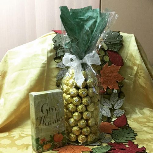 Wine bottle covered with chocolates