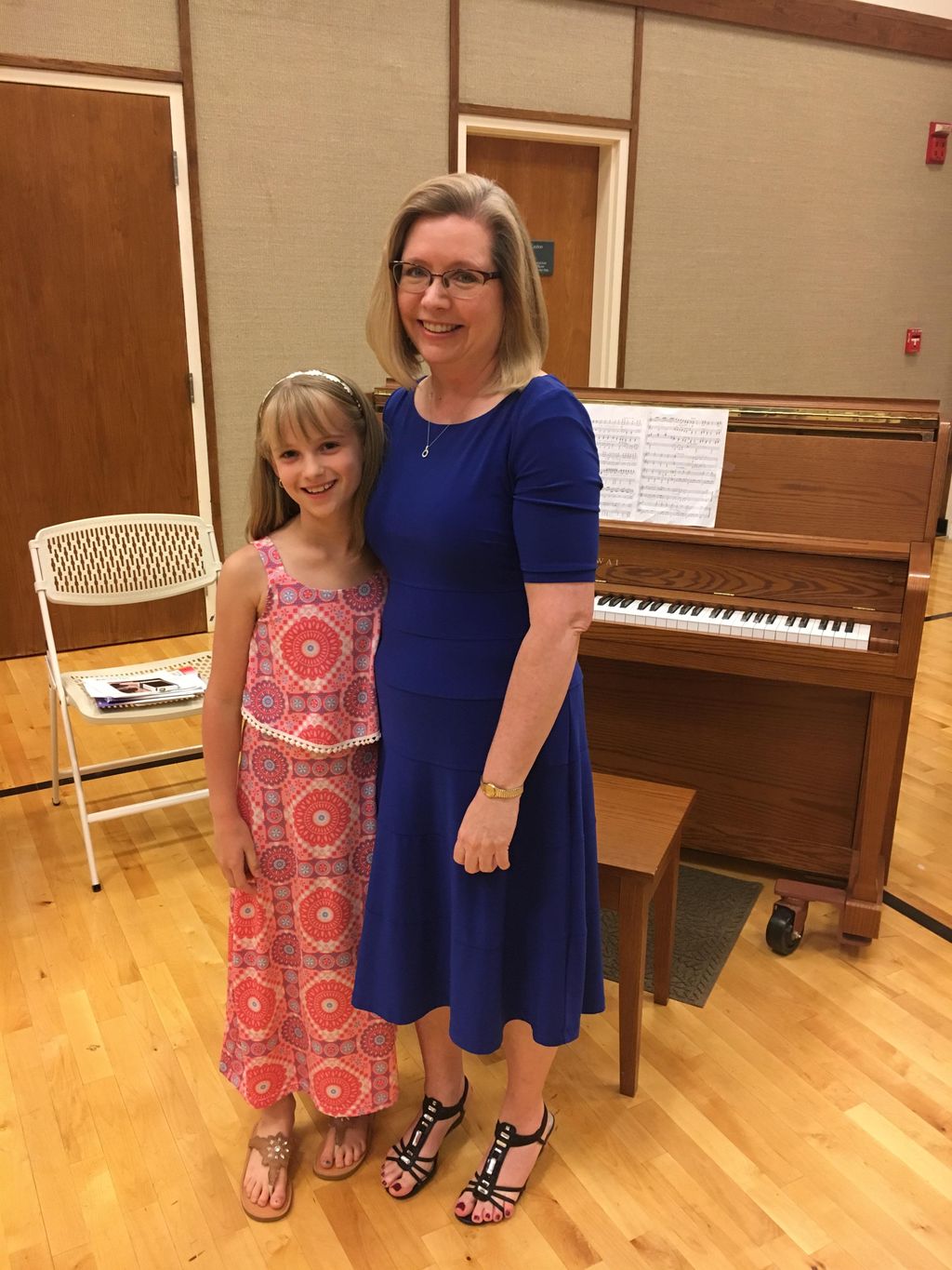 A very proud teacher and bright young piano star!