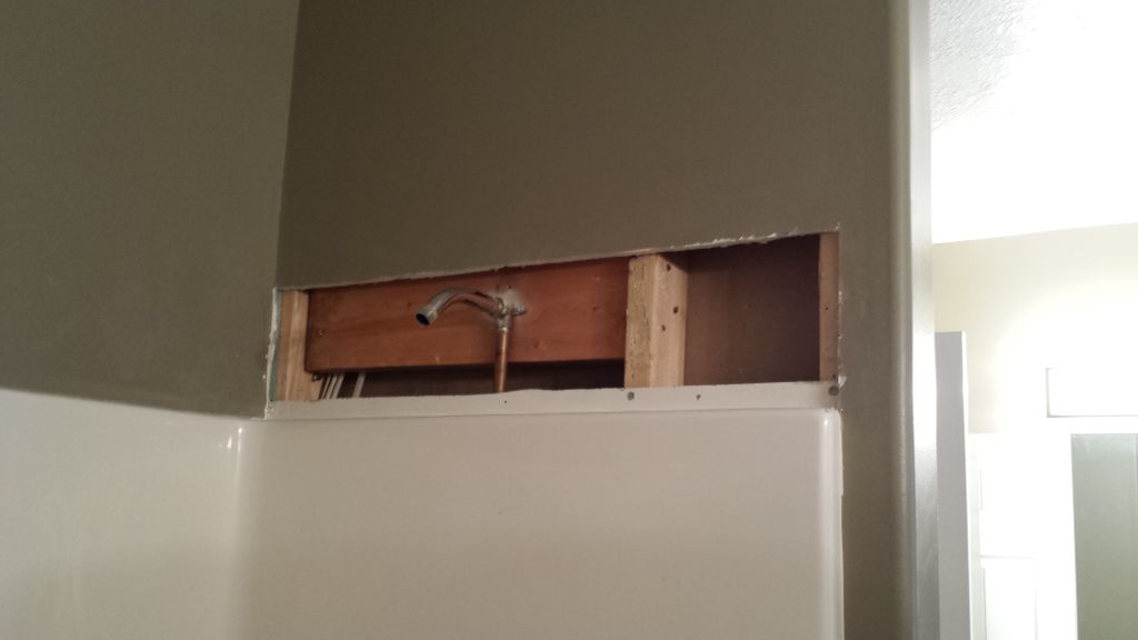 Shower head leaked and ruined the drywall.