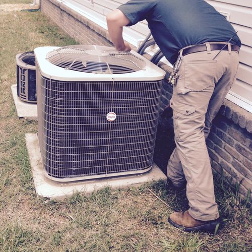 Installing a new Payne condenser.