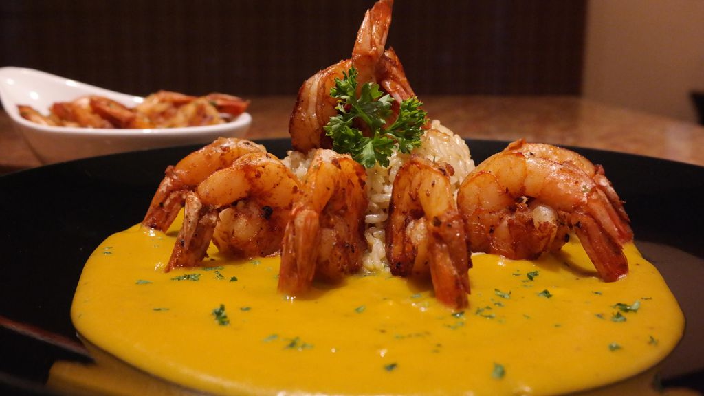 Blacken shrimp in pumpkin coconut sauce