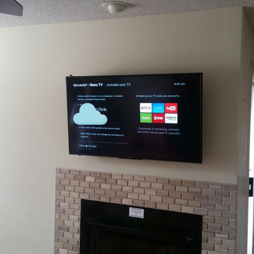 CTech LLC - Destin TV Wall mount above fireplace w
