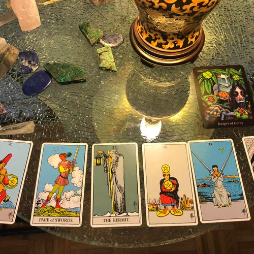 A tarot spread from a FREE monthly reading. 