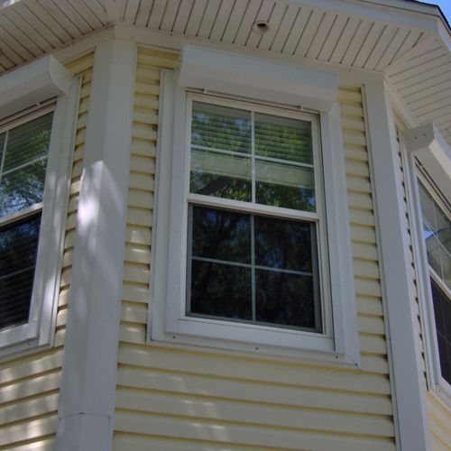 Replacement vinyl energy-efficient windows