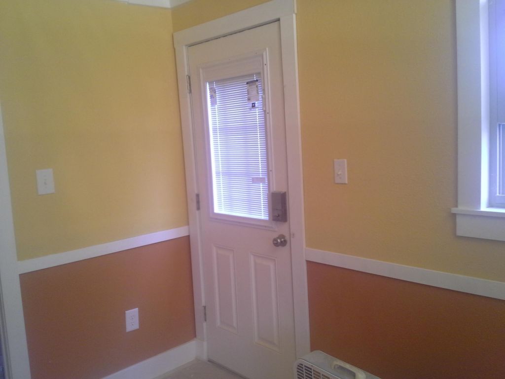painted master bed room and trim 2 tones
