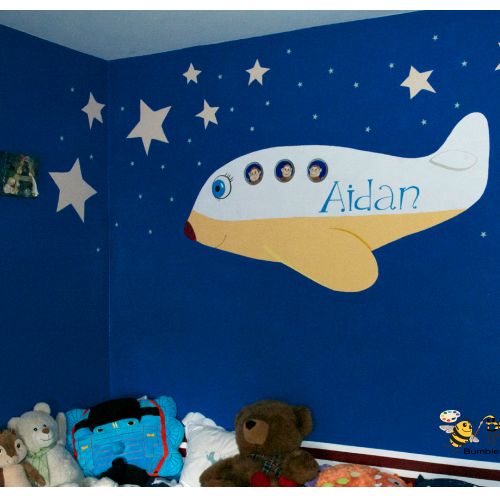 Cute airplane piloted by monkeys mural.  The mural