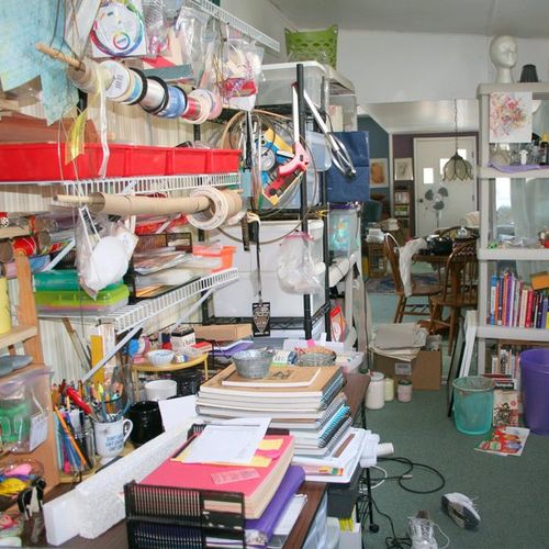 Craft room BEFORE; drowning in clutter & no space 