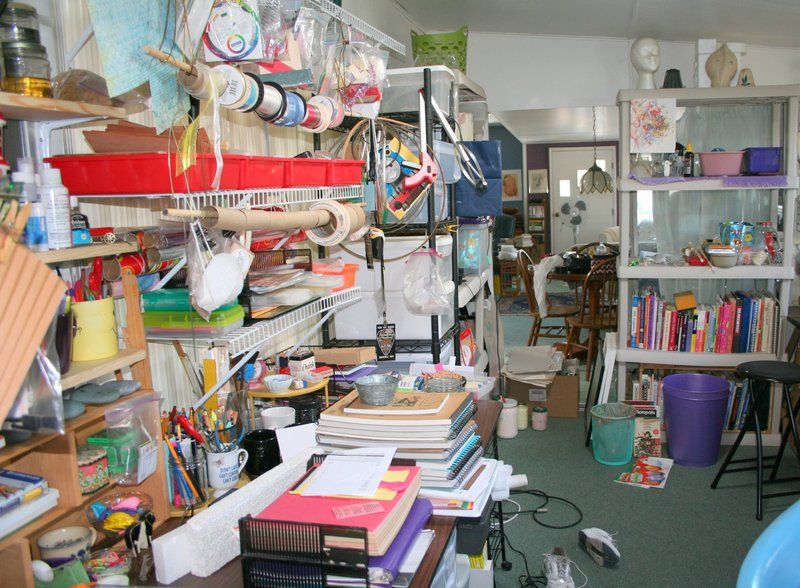 Craft room BEFORE; drowning in clutter & no space 