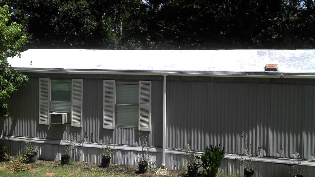 Roof coating on mobile home