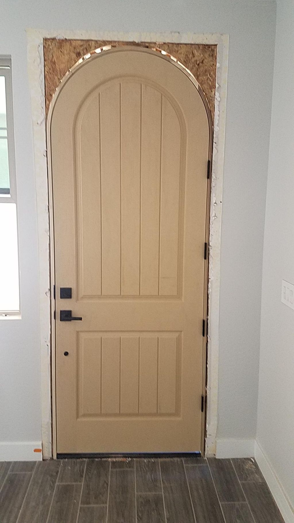 framed a square top door to accommodate a full arc