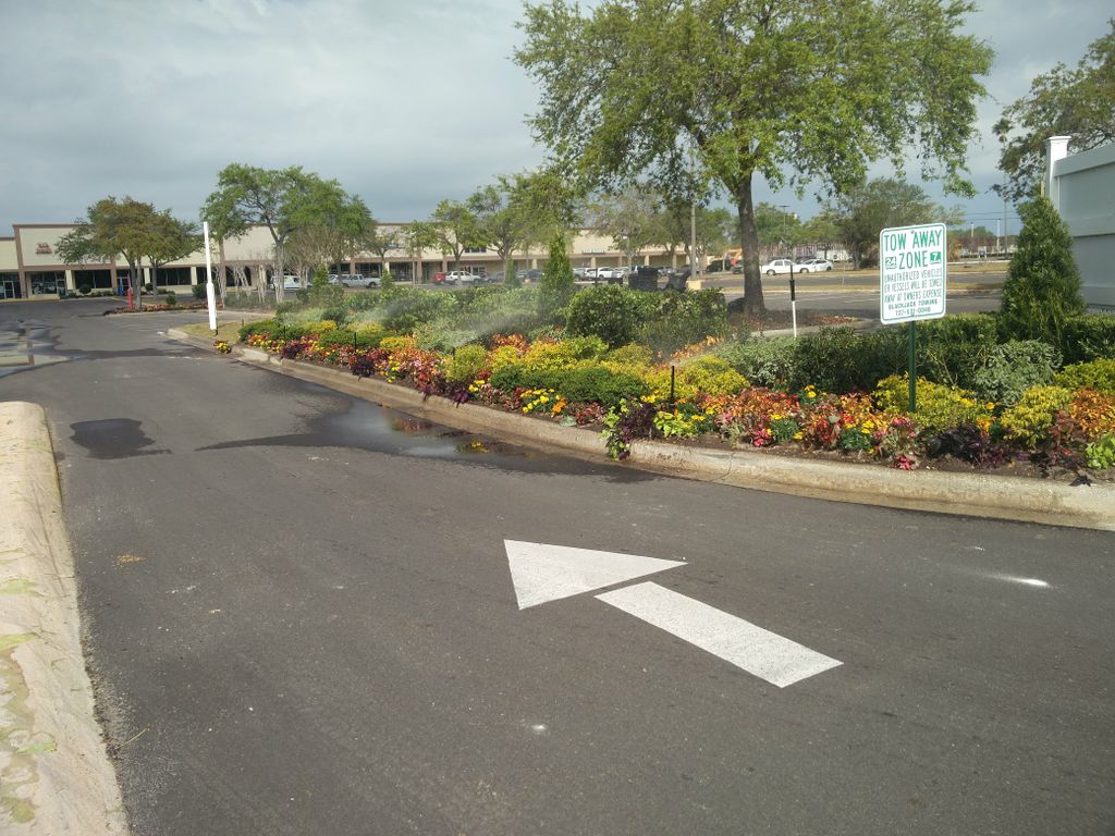 Irrigating landscaping in a shopping center median