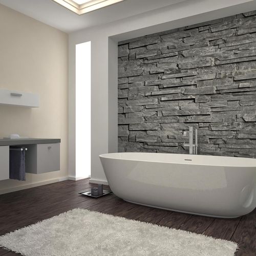 A stone wall accent always makes the room stand ou