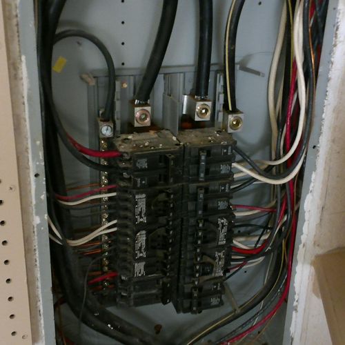 We pull panel covers and inspect wiring.