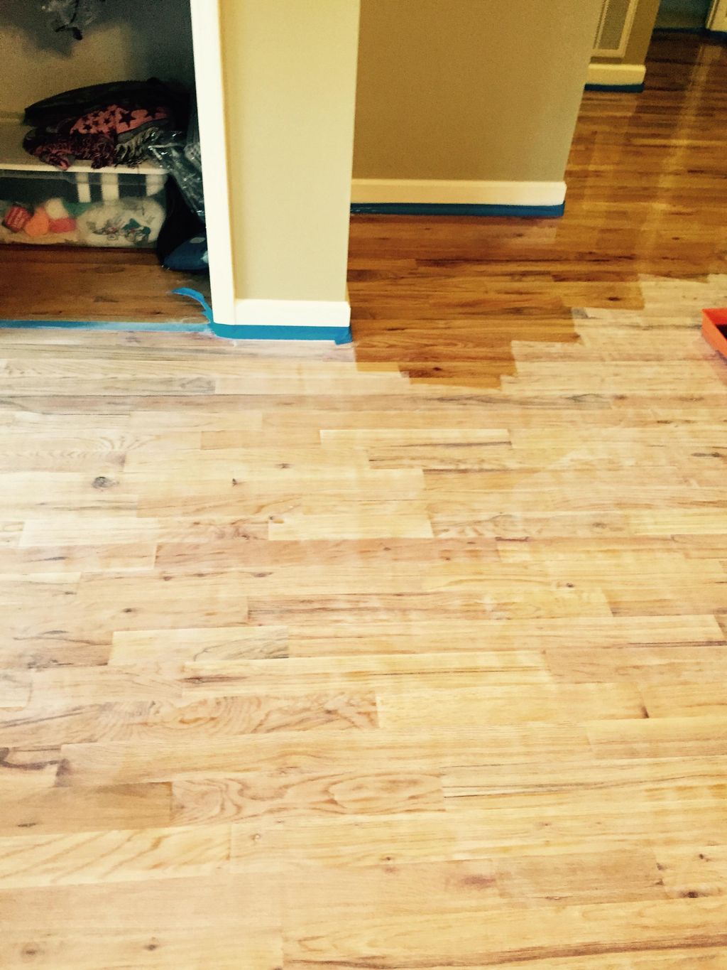 hardwood flooring while applying finish