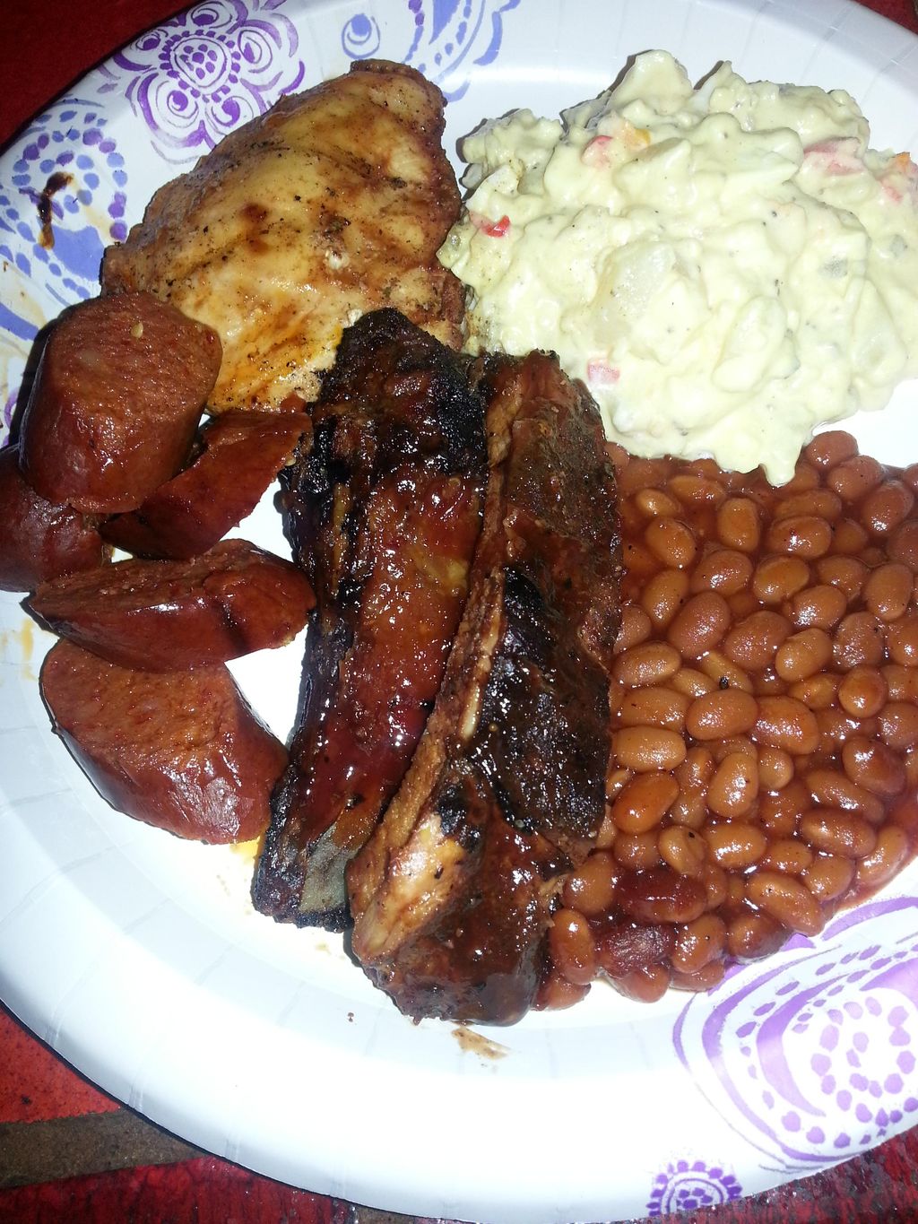 Bbq chicken, ribs, links,potato salad,  beans